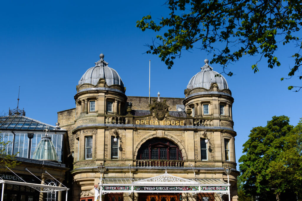 An image appreciating the architecture of Buxton Opera House on a fine sunny day